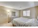 Neutral bedroom with carpet, a window, and a bed with a lighted headboard at 6735 W Charleston Blvd # 4, Las Vegas, NV 89146