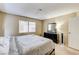 Serene bedroom with a bed, dresser, and a window allowing natural light to fill the space at 6735 W Charleston Blvd # 4, Las Vegas, NV 89146
