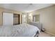 Neutral bedroom with carpet, a window, a closet, and a bed with a lighted headboard at 6735 W Charleston Blvd # 4, Las Vegas, NV 89146