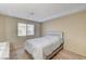 Neutral bedroom with carpet, a window, and a bed with a lighted headboard at 6735 W Charleston Blvd # 4, Las Vegas, NV 89146
