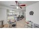 Bright eat-in kitchen featuring an island with bar seating and white cabinetry at 6735 W Charleston Blvd # 4, Las Vegas, NV 89146