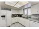 Spacious kitchen with stainless steel appliances, ample cabinet space, and marble countertops at 6735 W Charleston Blvd # 4, Las Vegas, NV 89146