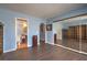 This room features mirrored closets and light blue walls at 6961 Ray Charles Ln, Las Vegas, NV 89119