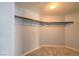 Walk-in closet providing lots of storage with hanging rods and shelving at 6961 Ray Charles Ln, Las Vegas, NV 89119