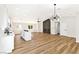 Bright, spacious living room open to kitchen, modern fireplace accent wall at 811 Spyglass Ln, Las Vegas, NV 89107