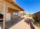 A covered patio offers views into the backyard of this home at 8125 Rio De Janeiro Dr, Las Vegas, NV 89128