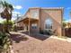 An exterior view of the backyard and covered patio at 8125 Rio De Janeiro Dr, Las Vegas, NV 89128