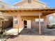 The backyard boasts a covered patio and desert landscaping at 8125 Rio De Janeiro Dr, Las Vegas, NV 89128