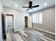 Bedroom showcasing modern ceiling fan, a closet, and attractive plank flooring at 8125 Rio De Janeiro Dr, Las Vegas, NV 89128