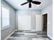 This bedroom offers wood-look floors, a window, a closet, and an attached door at 8125 Rio De Janeiro Dr, Las Vegas, NV 89128