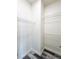 Walk in closet with metal shelving and wood floor at 8125 Rio De Janeiro Dr, Las Vegas, NV 89128