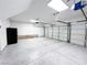 Spacious two car garage with speckled epoxy flooring and automatic doors at 8125 Rio De Janeiro Dr, Las Vegas, NV 89128