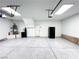 Massive two car garage with speckled epoxy flooring. Includes water heater at 8125 Rio De Janeiro Dr, Las Vegas, NV 89128