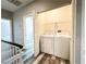 Hallway with laundry closet that contains a full size washer and dryer at 8125 Rio De Janeiro Dr, Las Vegas, NV 89128