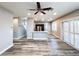 Spacious living room with hardwood floors, lots of natural light, and modern fixtures at 8125 Rio De Janeiro Dr, Las Vegas, NV 89128