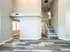 Spacious living room showing staircase and access to other living spaces at 8125 Rio De Janeiro Dr, Las Vegas, NV 89128