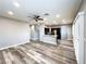 Open-concept living room features hardwood floors, ceiling fan, and recessed lighting at 8125 Rio De Janeiro Dr, Las Vegas, NV 89128