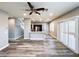 Expansive open layout showcasing new flooring, modern kitchen, and plentiful natural light at 8125 Rio De Janeiro Dr, Las Vegas, NV 89128