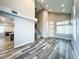 Open-plan living room with vaulted ceilings and access to the kitchen at 8125 Rio De Janeiro Dr, Las Vegas, NV 89128