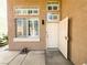 Home's side entrance with multiple windows, clean lines, and easy access, blending functionality and design at 8125 Rio De Janeiro Dr, Las Vegas, NV 89128
