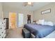 Bedroom featuring an ensuite bath and a closet for ample storage at 8490 Classique Ave # 101, Las Vegas, NV 89178