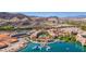 Picturesque aerial view of Lake Las Vegas with European-style buildings and water activities at 89 Via Franello, Henderson, NV 89011