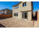 Back of the house with patio and unfinished backyard at 89 Via Franello, Henderson, NV 89011