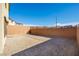 Large, undeveloped backyard space with privacy wall and mountain views at 89 Via Franello, Henderson, NV 89011