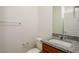 Bathroom with granite countertop, white sink and matching toilet at 89 Via Franello, Henderson, NV 89011