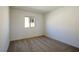 Bedroom with large window offering great natural light and carpet floor at 89 Via Franello, Henderson, NV 89011