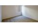Clean, bright bedroom with neutral carpet, freshly painted walls and a big window at 89 Via Franello, Henderson, NV 89011