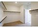 Walk-in closet with built-in shelving and ample storage space at 89 Via Franello, Henderson, NV 89011