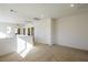 Bright hallway with carpet and white walls, leading to other rooms at 89 Via Franello, Henderson, NV 89011