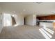 Bright, open-concept living area flows seamlessly to the kitchen and stairway, filled with natural light at 89 Via Franello, Henderson, NV 89011