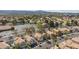 An aerial view shows lush landscaping and tile roofs in this desirable residential neighborhood at 92 Sea Holly Way, Henderson, NV 89074