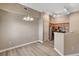 Kitchen and dining area with wood cabinetry, stainless steel appliances at 9303 Gilcrease Ave # 2217, Las Vegas, NV 89149