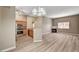 Inviting open-concept kitchen flows into living space with fireplace at 9303 Gilcrease Ave # 2217, Las Vegas, NV 89149