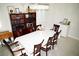 Dining room with a table for eight and a hutch with open storage at 9440 Grenville Ave, Las Vegas, NV 89134