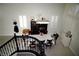 Aerial view of the dining room featuring tile floors and seating for eight at 9440 Grenville Ave, Las Vegas, NV 89134