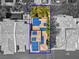 Aerial view of the home highlighting the roof with solar panels at 9975 Sand Key St, Las Vegas, NV 89178
