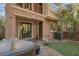 A charming outdoor space with mature landscaping, perfect for relaxation and entertaining at 9975 Sand Key St, Las Vegas, NV 89178