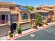 A beautiful townhouse with a two-car garage and solar panels on the roof at 9975 Sand Key St, Las Vegas, NV 89178