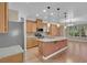 Modern kitchen with stainless steel appliances, an island, and beautiful countertops at 9975 Sand Key St, Las Vegas, NV 89178