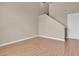 Well-lit living space with adjacent stairs and lots of natural light at 9975 Sand Key St, Las Vegas, NV 89178