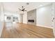 Expansive living area featuring modern fireplace and open floor plan at 10017 Snow Crest Pl, Las Vegas, NV 89134