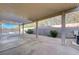 Covered patio overlooking a pool and spa at 10518 Santerno St, Las Vegas, NV 89141