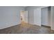 Bedroom featuring carpet, an open door to another room, and a closet with sliding doors at 10518 Santerno St, Las Vegas, NV 89141