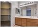 Bathroom features a double sink vanity and walk-in closet at 10518 Santerno St, Las Vegas, NV 89141