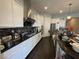 Modern kitchen featuring white cabinets, granite countertops, and stainless steel appliances at 119 Colantonio Ct, Las Vegas, NV 89138