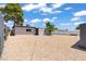 Expansive backyard with low-maintenance gravel, offering ample space and potential for landscaping or recreational use at 1417 Dogwood Ave, North Las Vegas, NV 89030